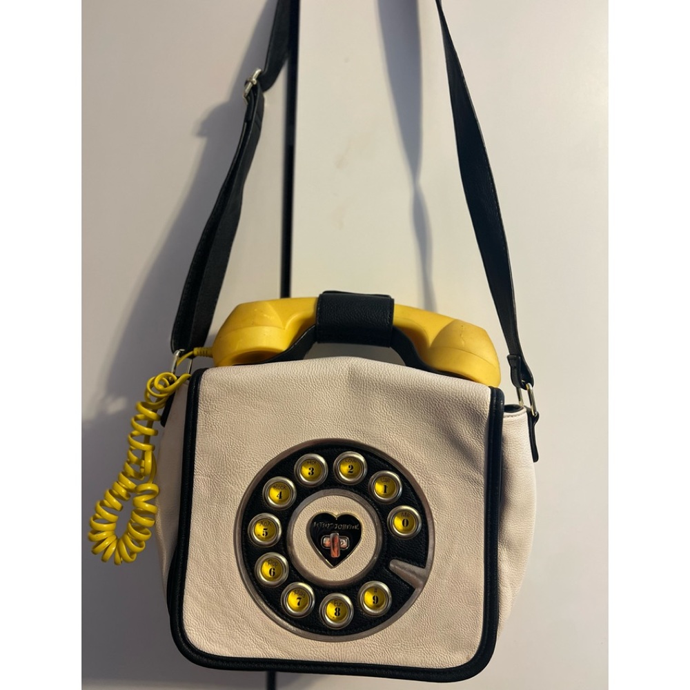 Betsy Johnson cross body bag that connects to phones and speaker